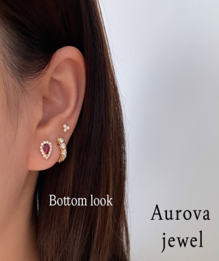 Pear Ruby Halo Stud Earrings in Yellow Gold