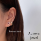 Pear Ruby Halo Stud Earrings in Yellow Gold