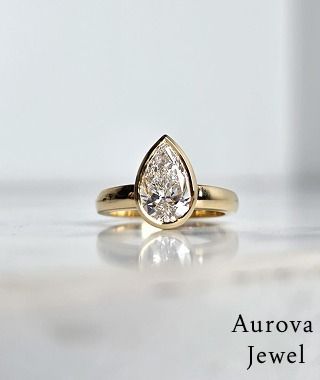 Luxury Pear Cut Bezel Set Solitaire Diamond Engagement Ring in 14K Yellow Gold &ndash; Modern Minimalist Bridal Ring for Women