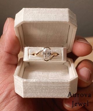 Luxury Pear Cut Solitaire Diamond Engagement Ring in 14K Rose Gold – Modern Twisted Bypass Bridal Ring for Women